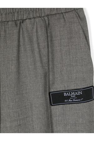 grey virgin wool trousers BALMAIN PARIS KIDS | BV6R80I0231810